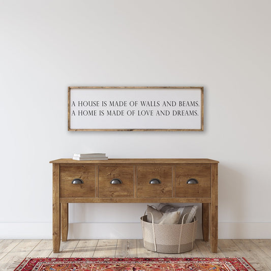 A House is Made of Walls and Beams Wood Sign