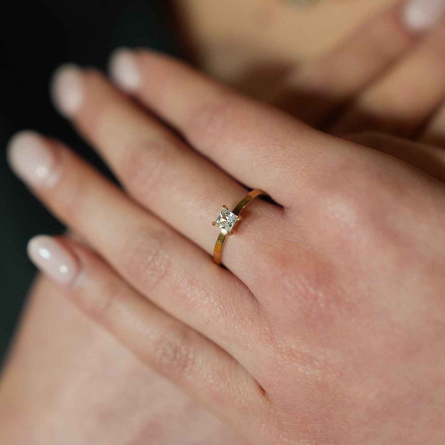 ADHIKA: Classic Gold Ring with a Square Zirconia Centerpiece