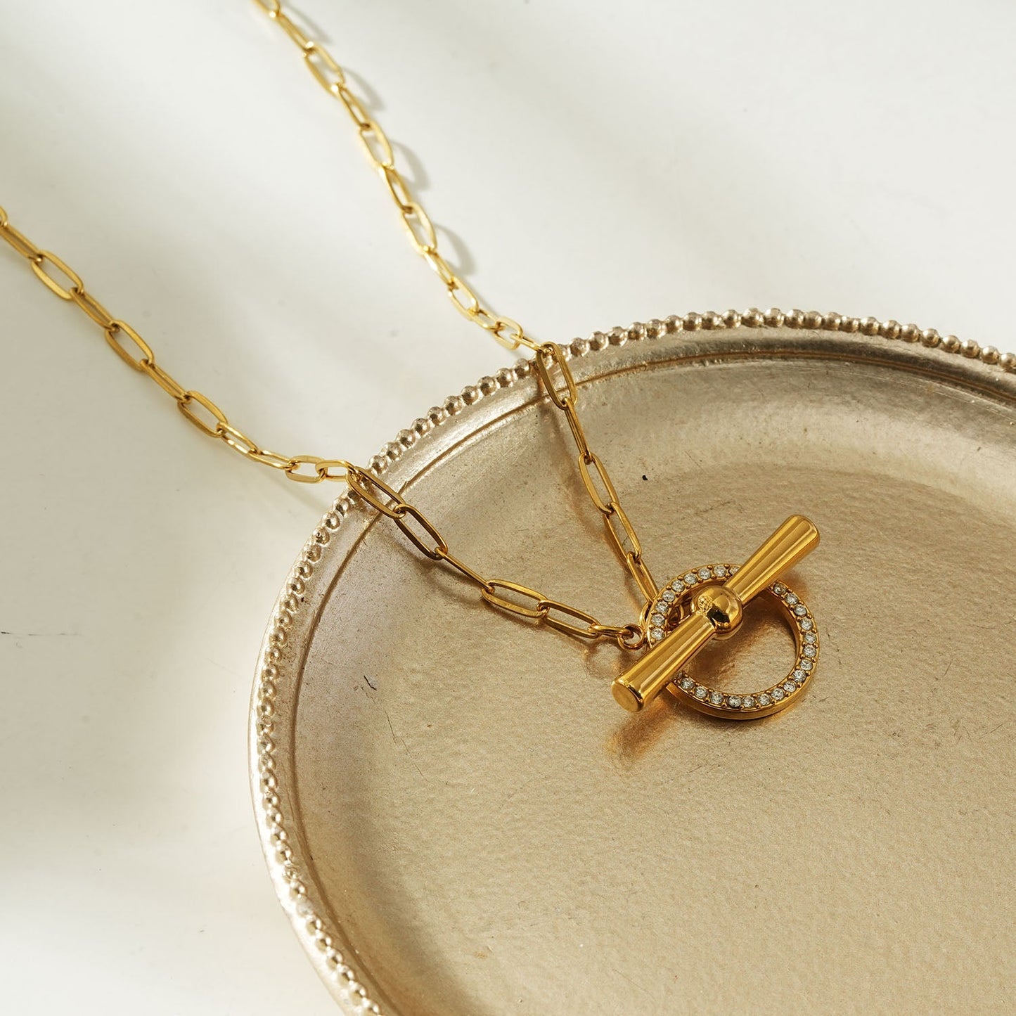 SADIKA Gold: Modern Pavé Zirconia Halo Toggle Necklace