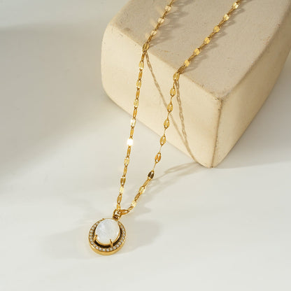 HAMMELA Gold: Pendant Necklace with a Pearl Centre & Crystal Halo