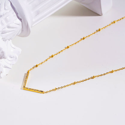 SANITA: Beaded Dainty Chain Anchoring 'V' Shaped Zirconia Embedded Pendant Charm